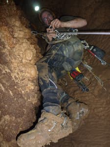 The cave descent was slick with mud and required rope work similar to canyoneering and mountaineering.