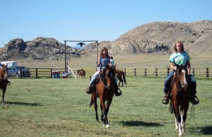 Neighbors bring their horses to the Pathfinder Ranch's annual Pathfinder Days celebration. (Dustin Bleizeffer/WyoFile)