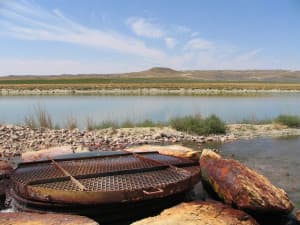 Most coal-bed methane wells bring up large volumes of water along with the methane.This 2006 photo shows a water-discharge facility on a Johnson County ranch near the Powder River. Dustin Bleizeffer/WyoFile)