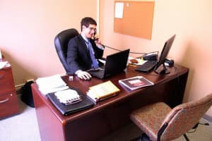 Healthcare policy advisor Charlie Katebi works in the offices of the Wyoming Liberty Group. The nonprofit organization is affiliated with the State Policy Network of conservative think tanks. (Gregory Nickerson/WyoFile)