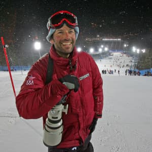 Jonathan Selkowitz  scouts the Sestriere slalom hill during the 2006 Olympics in Italy, looking for a location to photograph the second run of the Women's combined event. Hard work and talent earned him the International Ski Federation's Journalist of the Year award in 2012. (Jed Jacobsohn)