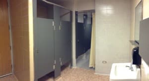 Shared bathrooms with showers, like this one in White Hall, are not included in modern dormitory designs, according to Kurt Haapala of Mahlum Architects. (Gregory Nickerson/WyoFile)