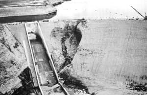 Fontenelle Dam almost failed soon after it was built and filled in 1965, but emergency action saved the day. After that, the Bureau of Reclamation used 203,500 sacks of cement to stop "piping" leaks that created the sinkhole, according to a presentation by University of Missouri-Rolla Geology and Engineering Department Chairman Karl F. Hasselmann and others. (University of Missouri)