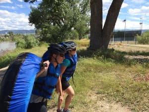 Christine Peterson and Kelsey Dayton finish Casper Strong July 12. The race finishes with a float through the Casper whitewater park and down the river. (courtesy Josh Peterson)