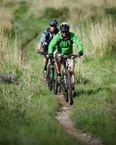 Mountain bikers ride a trail near Jackson. (courtesy Doug Ayers)
