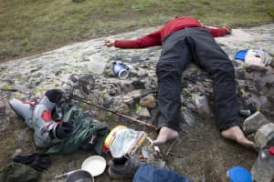 Exhausted climbers, like this one in a Wyoming range, might seek to immerse themselves in small pools after a long day, recreation advocates say. A change in state regulations would make people identify such places to maintain the toughest E. coli standard. (Angus M. Thuermer Jr./WyoFile)