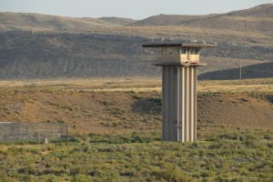 A guard tower at the Wyoming State Penitentiary outside Rawlins. Many people don't see Rawlins' recreational opportunities in nearby mountains and the Red Desert, Burkhart said. (Gregory Nickerson/WyoFile)