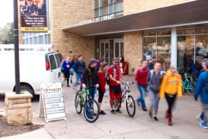University of Wyoming students in front of Coe Library. As the state faces a $159 million projected deficit for 2016, the University of Wyoming has set up a process for granting exemptions to the hiring freeze. (Gregory Nickerson/WyoFile)