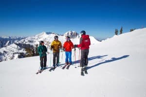 Instructor Ann Schorling talks to adult students before skiing at Jackson Hole Mountain Resort. Ski lessons aren't just for beginners, or kids. (Courtesy Jackson Hole Mountain Resort)