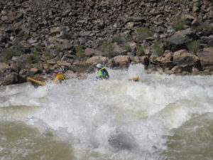 John Metcalfe navigate's his dory through Colorado River whitewater in the Grand Canyon, no handholding required. (Courtesy of Geoffrey O'Gara)