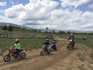 With kids under 16 unable to legal ride Forest Service roads, the Sander and Fischer families instead take to the popular Red Lake Trail near Cody. Dana Sander is among those who'd like to see more motorized trials — which do allow kids to operate their own machines — added to the Shoshone National Forest. (Photo by Dana Sander)