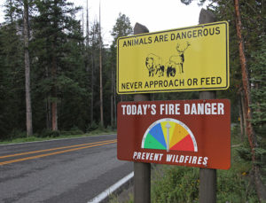 Signs, fliers and handouts can tell park visitors what to do, but without the 'why' they're incompletely effective. (Photo Courtesy of Jim Peaco)