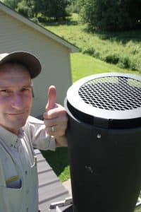 As far away as Vermont, a staff member at the Missisquoi National Refuge installs a screen received from the Teton Raptor Center. (U.S. Fish and Wildlife Service) 