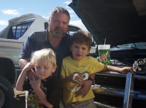 James Whitten got laid off from the oil patch and is having a rough time making ends meet for his family, including sons Adam and Adrian. “I got a sick feeling in my stomach when I saw gas at $1.60 a gallon,” he said. (Andrew Graham/WyoFile)