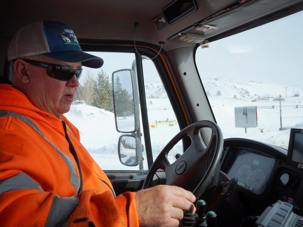 Through black ice and whiteouts, plow driver minds South Pass