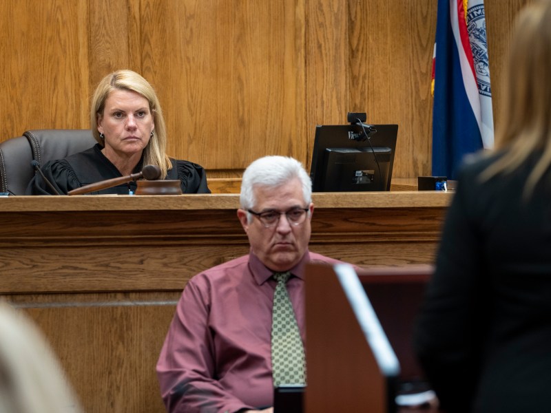 Judge Owens sits behind the bench at the courthouse