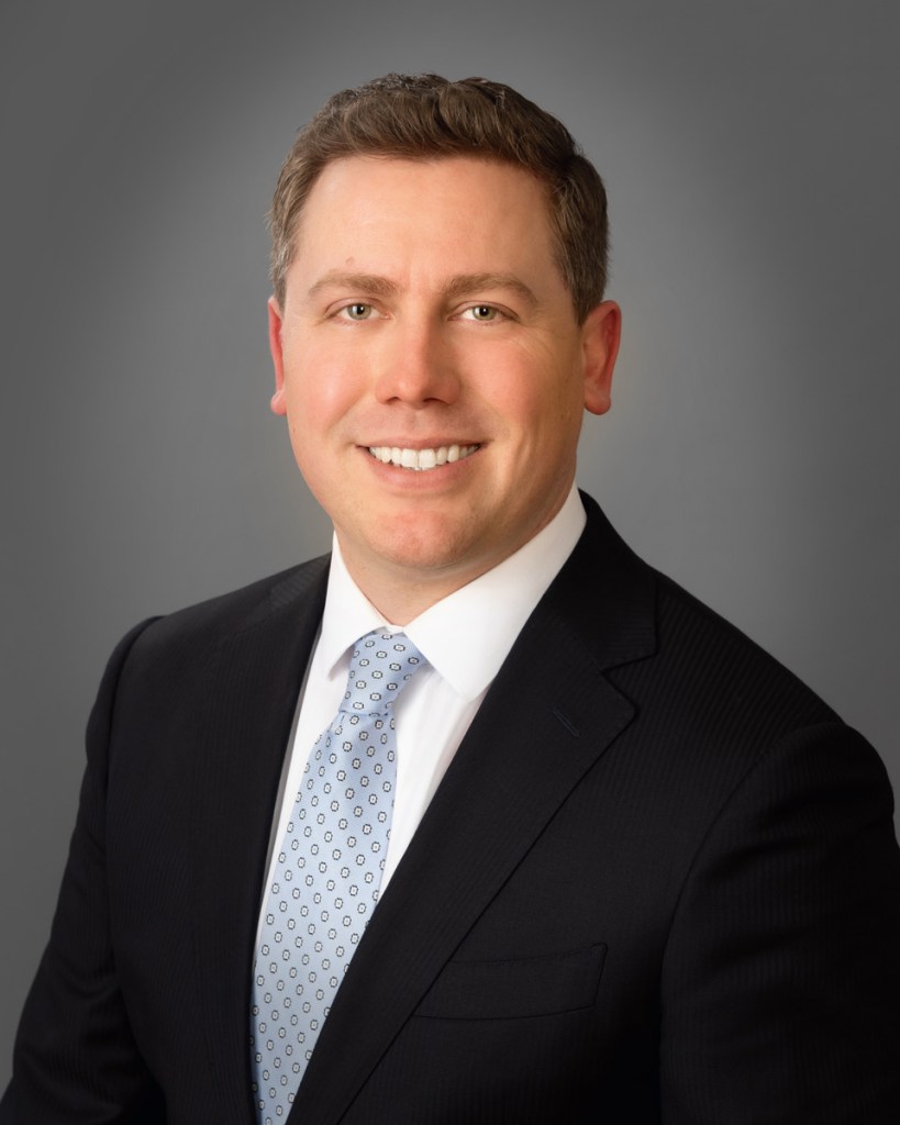 A professional headshot of Stefan Johansson