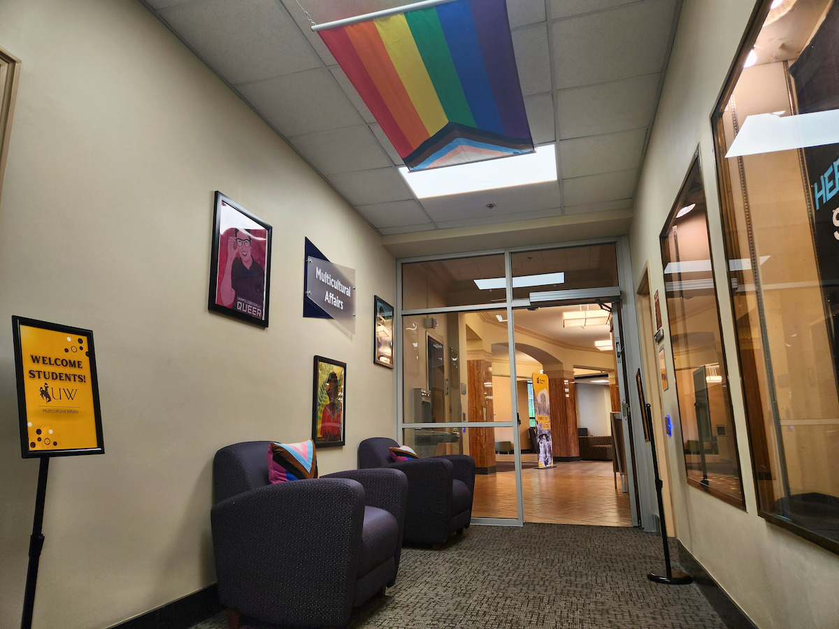 A hallway featuring a pride flag