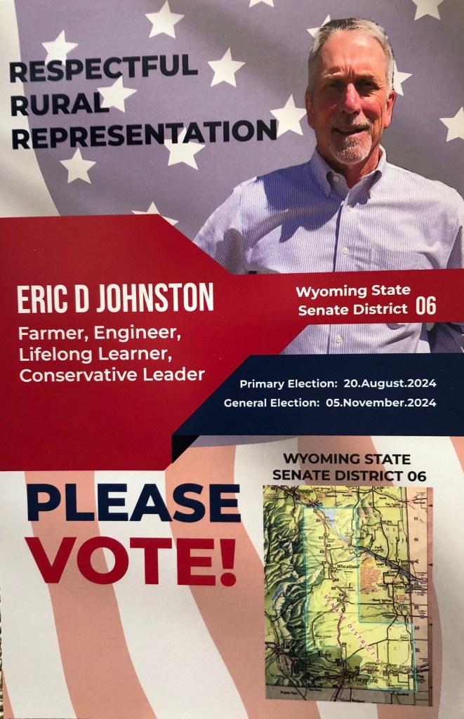 A flyer with an American flag background, saying: Eric D Johnston: Farmer, Engineer, Lifelong Learner, Conservative Leader. Wyoming State Senate District 06.
