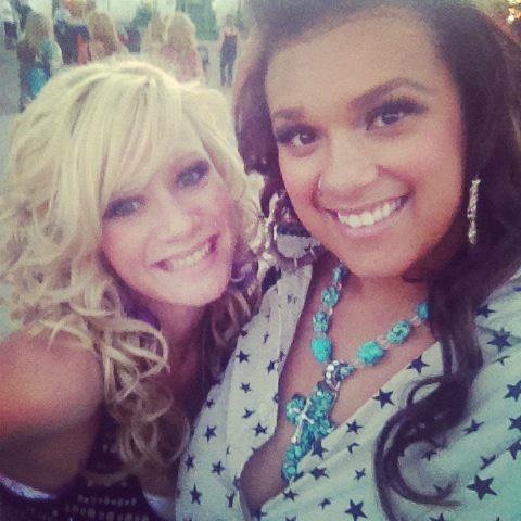 Two young women pose for a selfie