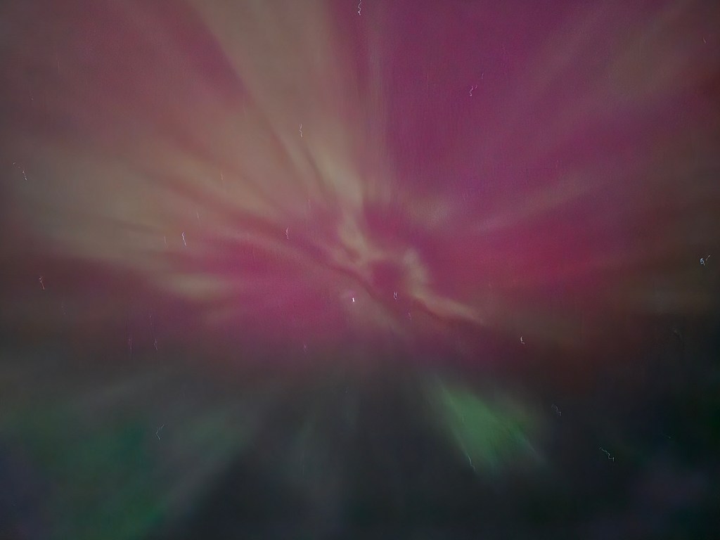 Looking into an aurora borealis overhead