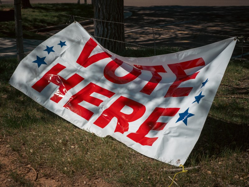 The sign says "vote here"