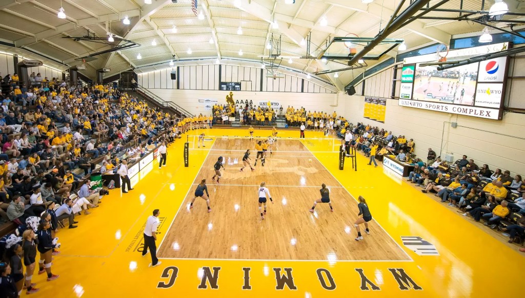 A volleyball court with players