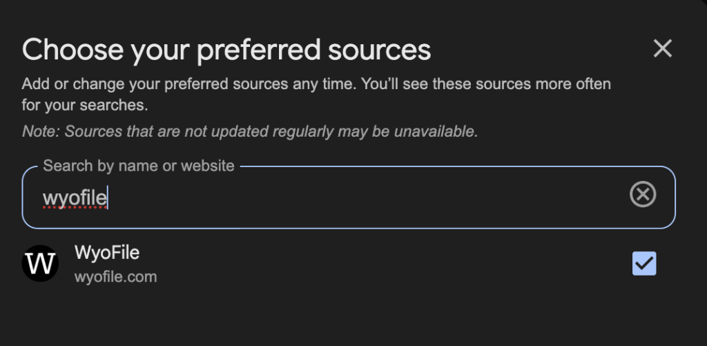 A dialog box titled "Choose your preferred sources" shows a search input with "WyoFile" typed. Below, "WyoFile" with a website link appears, checked.