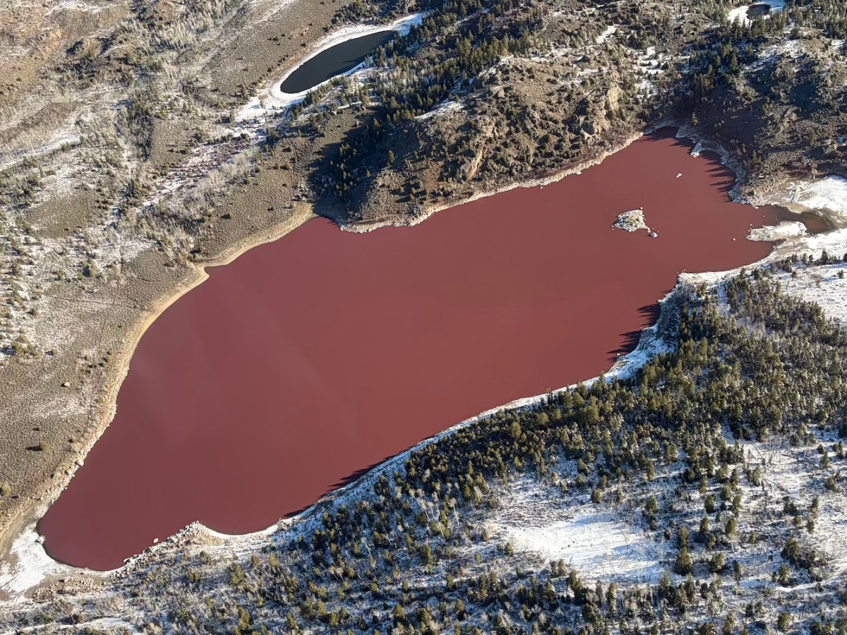 Wyoming lake’s unnerving rusty-red water persists as experts offer explanations