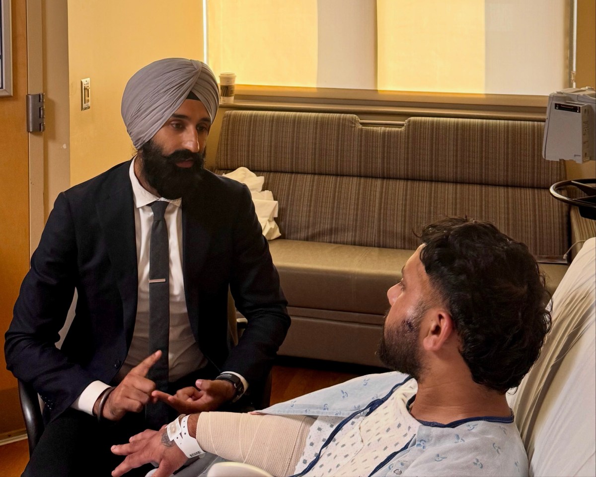 A Punjabi Sikh trucker recovering in a hospital from a knife attack at a Wyoming rest stop.