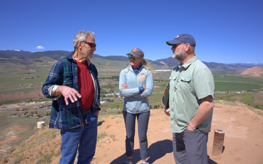 Members of the outdoor recreation space meet during a site visit.